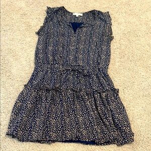 Navy sleeveless dress with white print and ruffle detail